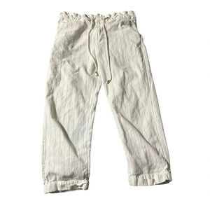 Urban Outfitters women's size medium cream colored pants with brown pin stripe